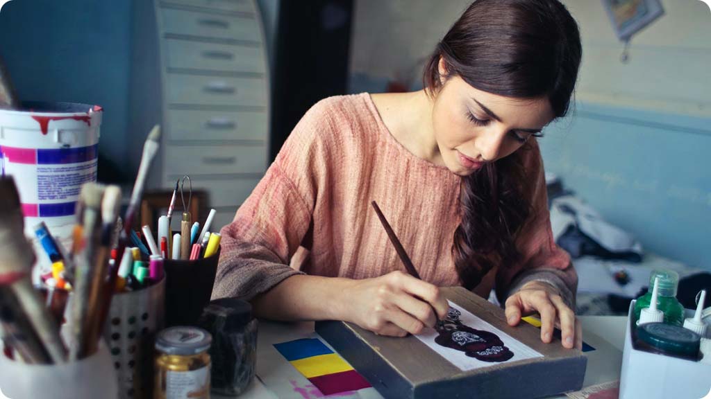 Woman drawing art -Benefits of being busy