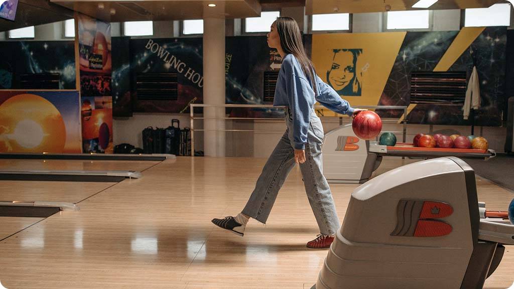 Woman playing bowling - 55 Fun Hobbies for women of all ages