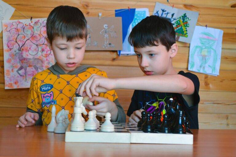 Children board games- Two children playing chess