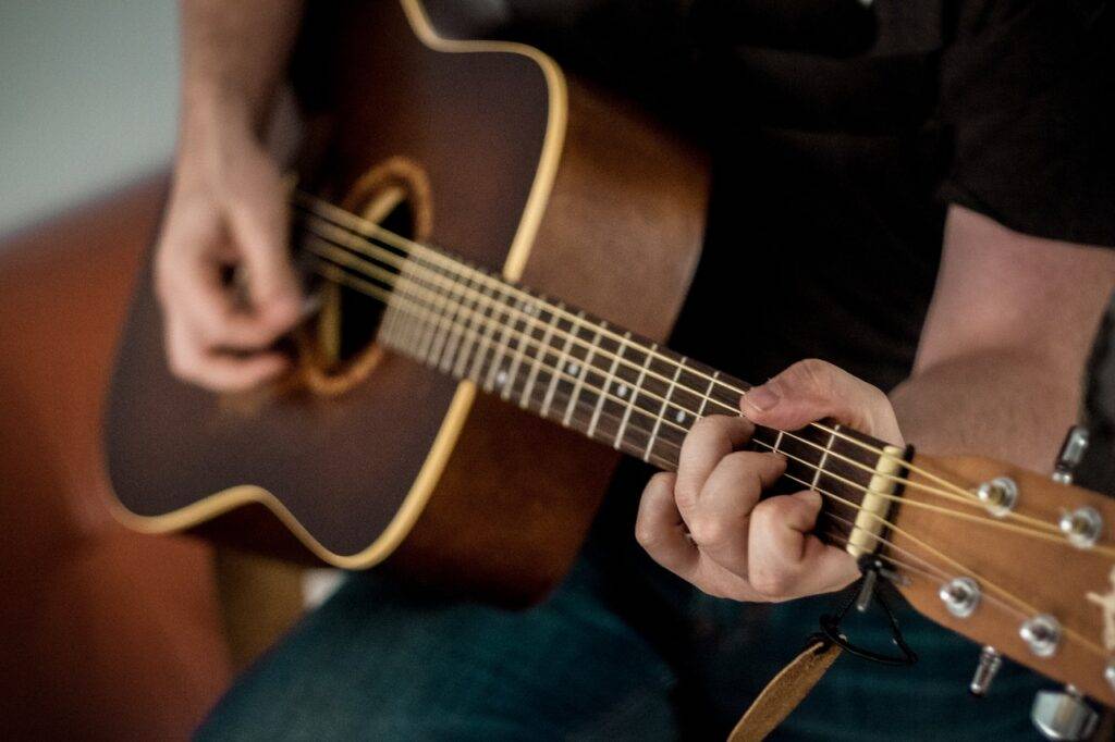 Man Playing A Guitar - Indoor Activities For Adults
